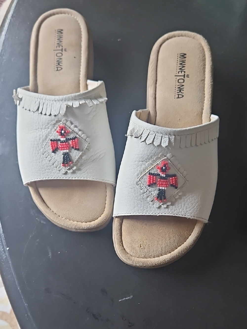 Minnetonka Cream Slide Sandals with Red & Black Beaded Motif